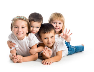 smiling children lying on the floor