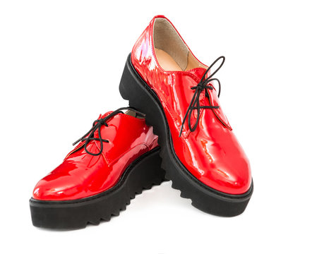 Pair Of Red Patent Leather Boots