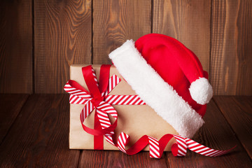 Obraz na płótnie Canvas Christmas gift box with santa hat