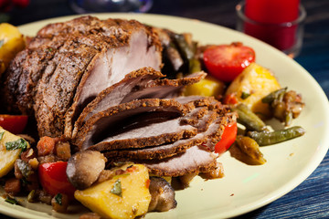 Juicy roast pork on the holiday table