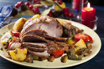 Juicy roast pork on the holiday table