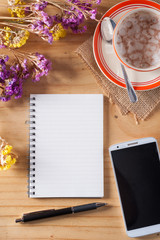 Notepad on wood table