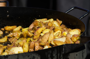 Baked potatoes on the pan