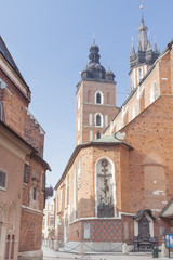 Fototapeta na wymiar Poland, Krakow, Plac Mariacki Square st Mary Curch, Midday