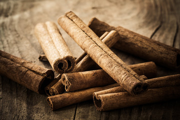 Cinnamon wide from close on a wooden table