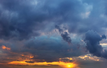 colorful sunset rays in the sky with clouds. sunset