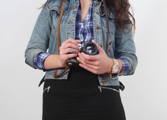 young girl holding camera