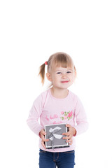 Portrait of cute little girl with gift box