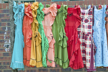 Brightly colored dresses on display in Zulu village in Zululand, South Africa