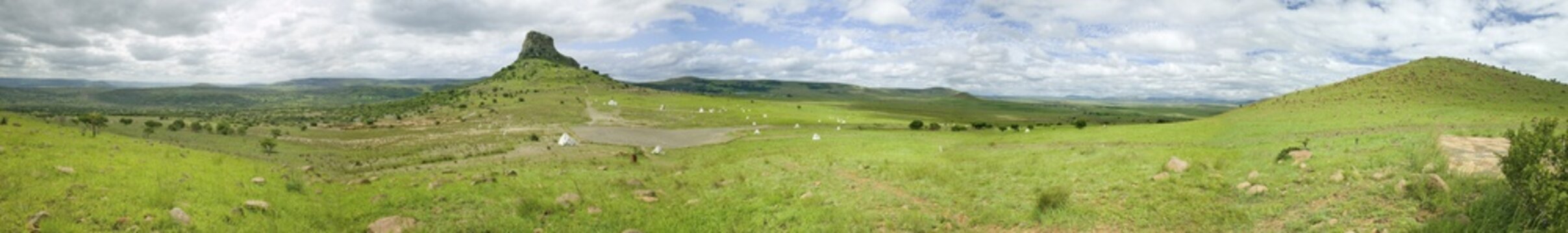 Panoramic view of Sandlwana hill or Sphinx with soldiers graves in foreground, the scene of the Anglo Zulu battle site of January 22, 1879. The great Battlefield of Isandlwana and the Oskarber, Zululand, northern Kwazulu Natal, South Africa