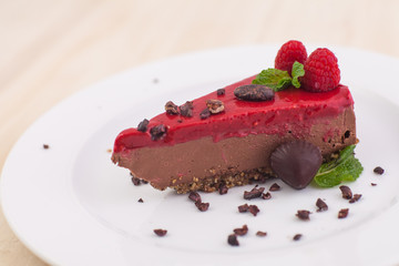 RAW chocolate cake with raspberries