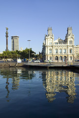 Morning water reflections of building at Port Vell, Old Harbor, Barcelona, Spain