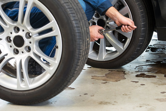 Mechanic Changing Tires