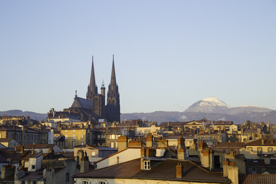 Roof top view of city center and volcano Puy de dome in Clermont ferrand, Auvergne, France