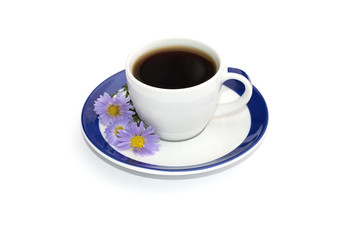 coffee on the saucer with a blue border decorated with three blu