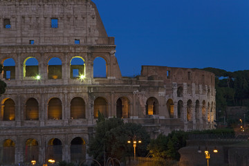 Fototapeta premium The Colosseum or Roman Coliseum at dusk, originally the Flavian Amphitheatre, an elliptical amphitheatre in the centre of the city of Rome, the largest ever built in the Roman Empire, Rome, Italy, Europe