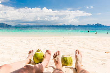 Fototapeta na wymiar Beach relax with coconut juice