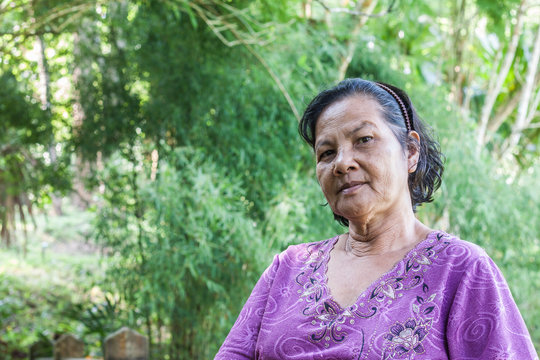 Old thai woman in garden