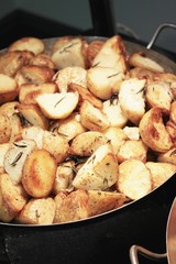 potatoes frying in pan