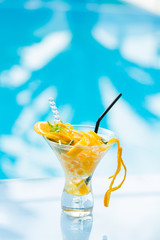 Mohito mojito drink with ice mint and lime near pool