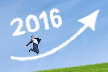Happy worker with numbers 2016 and upward arrow