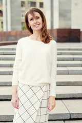 Fototapeta premium Young beautiful woman outdoor.