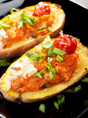 Stuffed potatos with tomatos