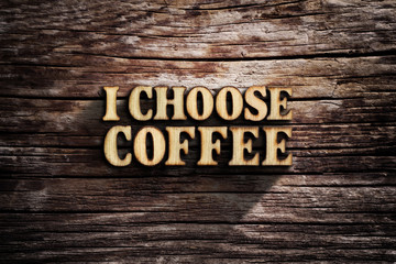 I choose Coffee. Words on old wooden board.