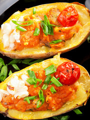 Stuffed potatos with tomatos