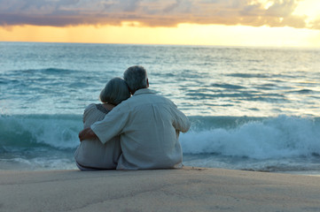 Fototapeta premium Elderly couple rest at tropical resort
