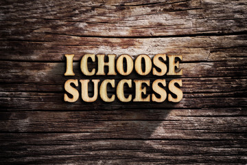 Fototapeta premium I choose Success. Words on old wooden board.