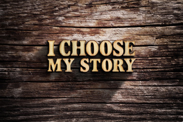 I choose My Story. Words on old wooden board.