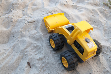 Toy Dozer in the Sand