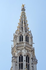 Fototapeta na wymiar Town hall tower on Grand Place in Brussels