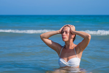 An attractive young woman at the beach