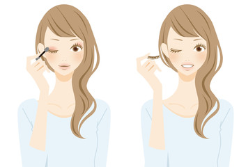 アイメイクをする女性 笑顔