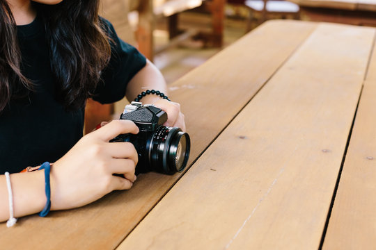 girl with vintage film camera