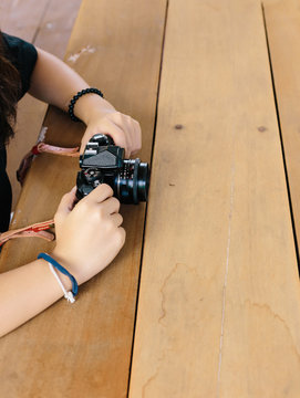 girl with vintage film camera