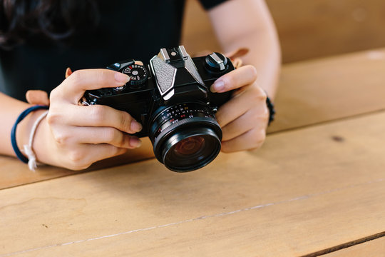 girl with vintage film camera