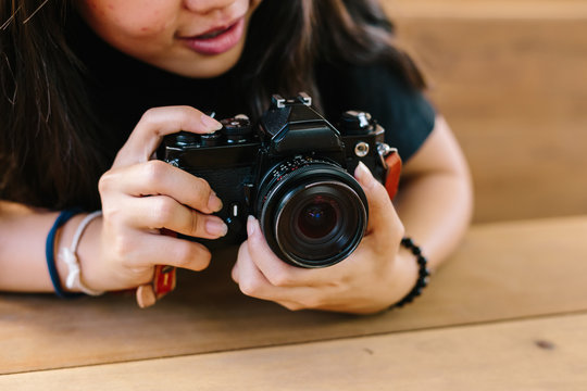 girl with vintage film camera