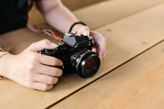 Vintage film Camera on wooden table
