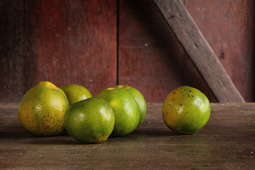Group of  Fresh Orange on Wood Table Desk