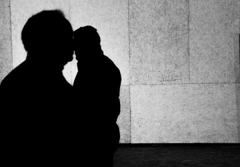 Artistic vintage abstract black and white silhouettes of two men
