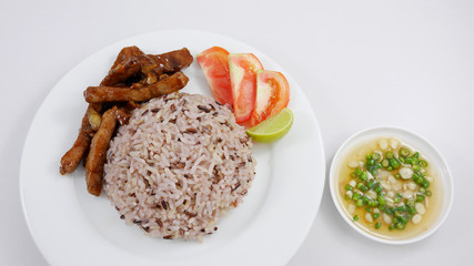 Brown rice and stir fried pork with black sweet soy sauce and chili fish sauce. (2)