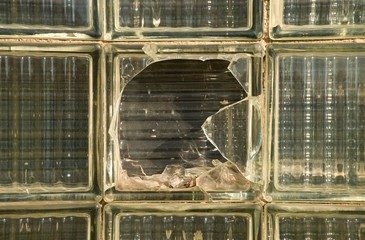Broken old glass brick wall. Postmodern socialist style