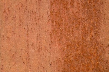 Metal corrosion. Orange gentle structure of oxidation on welded seam.