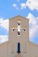 Church bell tower in a shape of the cross