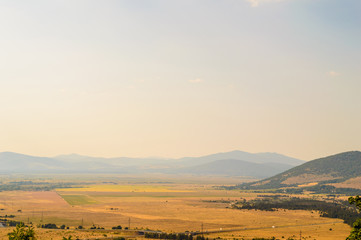 Fototapeta premium Rural landscape with late afternoon sky and farmland