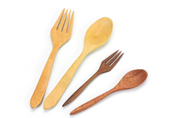 Assorted wooden tableware on white background