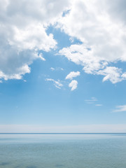 Naklejka na ściany i meble Seascape pastel tone with copy space and blue sky cloud vertical